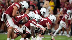 A close-up of the Oklahoma Sooners offensive line.